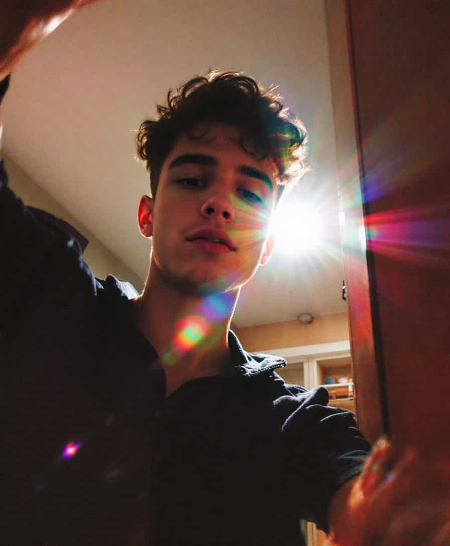 low quality phone photo, snapchat, grainy, male teenage taking morning selfie