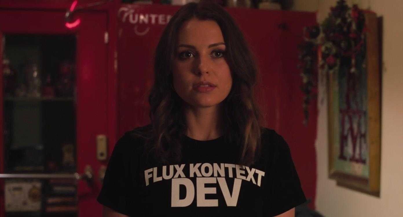 An image of a woman wearing a shirt that says FLUX KONTEXT DEV