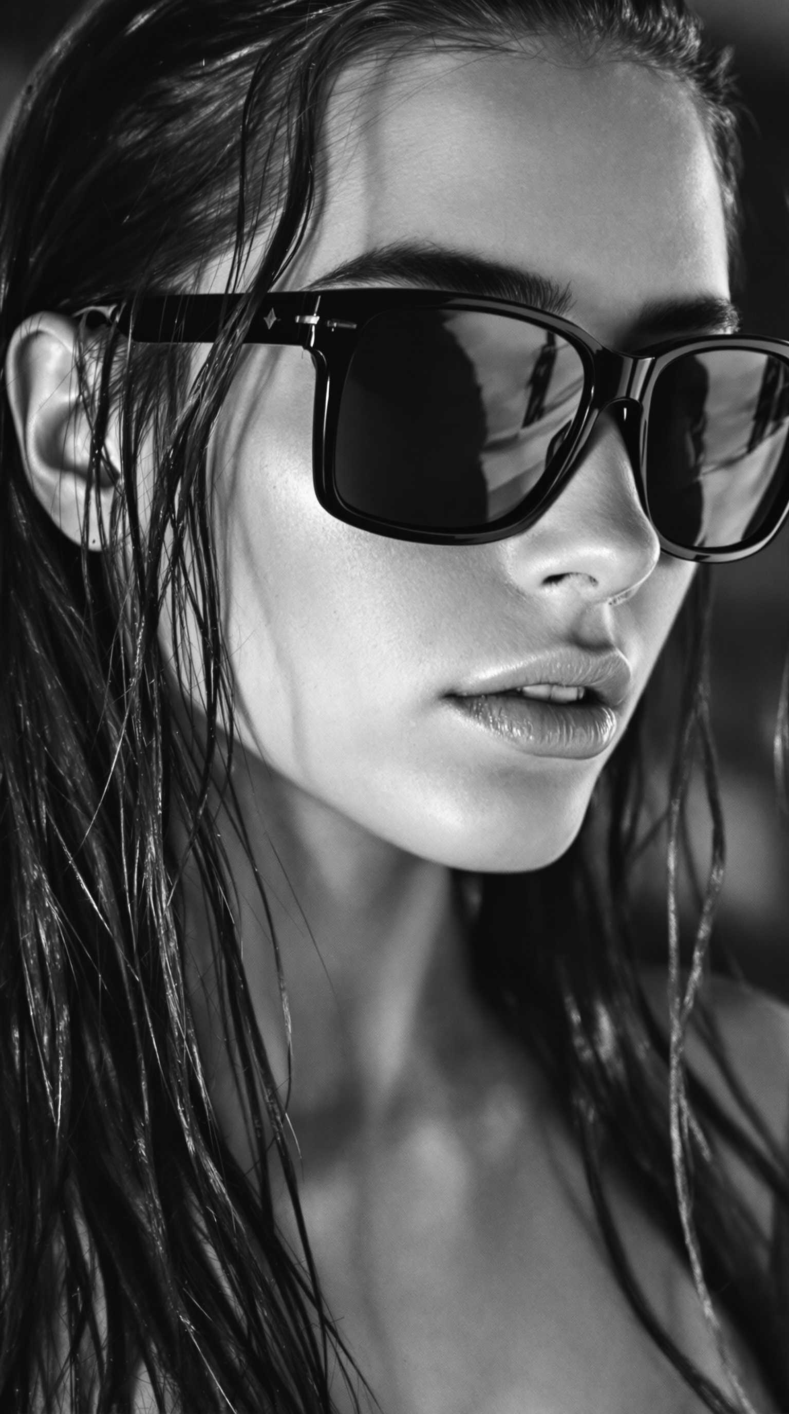 monochome, black and white film:1.3, 1girl, pretty girl, 20 yo, long hair, wet hair, slicked back hair, black sunglasses, wayfarerer sunglasses, high cheekbones, topless, small breasts, face focus, close-up, hyperdetailed, simple background