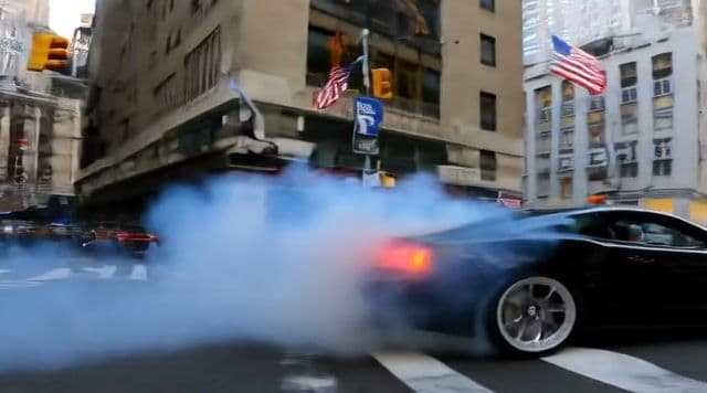 a car drifting through the busy streets of new york
