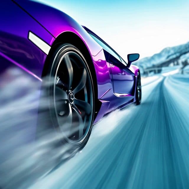 as the tires spin the snow and rain move off the tire. the car is moving very fast 
