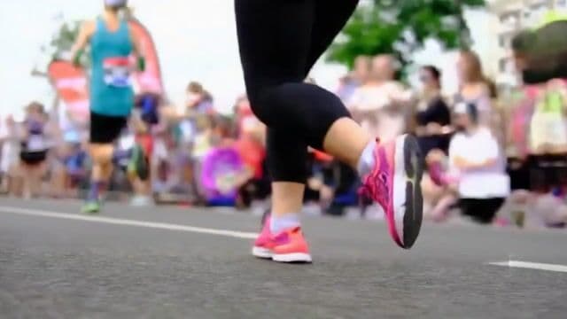 a woman jogging a marathon