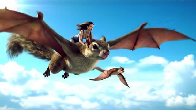 a woman flys through the sky on the back of a giant flying squirrel