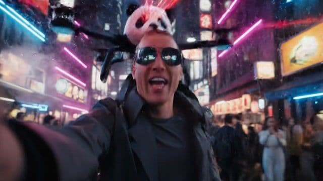 Handheld selfie-style medium shot, neon-drenched back-alley market in future Tokyo, midnight drizzle.
A trench-coated street hacker jogs while holding the camera at arm’s length; holographic ads flicker off his mirror-shades. Rain beads on chrome stalls, steam hisses from noodle carts, electric kanji signs strobe in magenta-cyan hues.
Behind him, a panda-faced security drone weaves through the crowd firing warning lasers that arc into the sky.
Hacker breathlessly pans the lens to show the drone closing in, then looks back to camera and yells:
“PixelDojo.ai just shipped Google VEO 3 video generation — shame these drones can’t take a hint!”
Quick tilt up to towering skyscrapers whose windows reflect pulsing pink light.
Tone: frantic but comedic vlog; lens flares, wet-street reflections, glitch overlays.