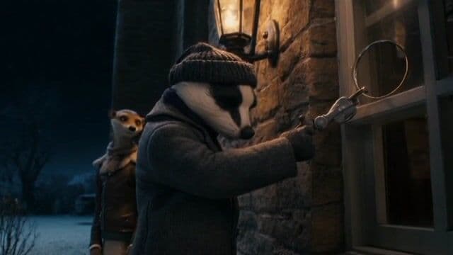 **Clip 8 (0:56-1:04):**
> **Prompt:** Exterior Mansion side window. Fred the badger is using a glass cutter tool on a window pane. Larry the weasel is looking around nervously, shivering.
