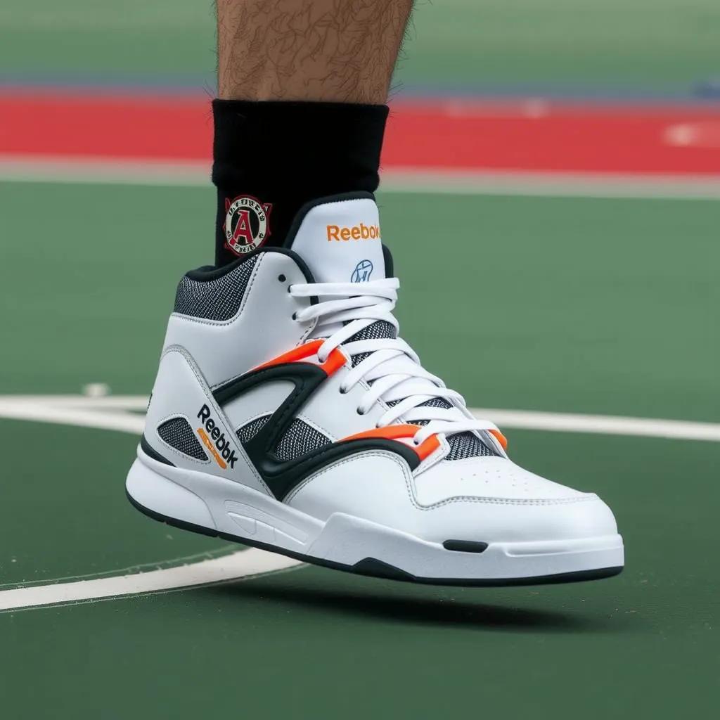 a basketball player wearing Reebok pump shoes of this style