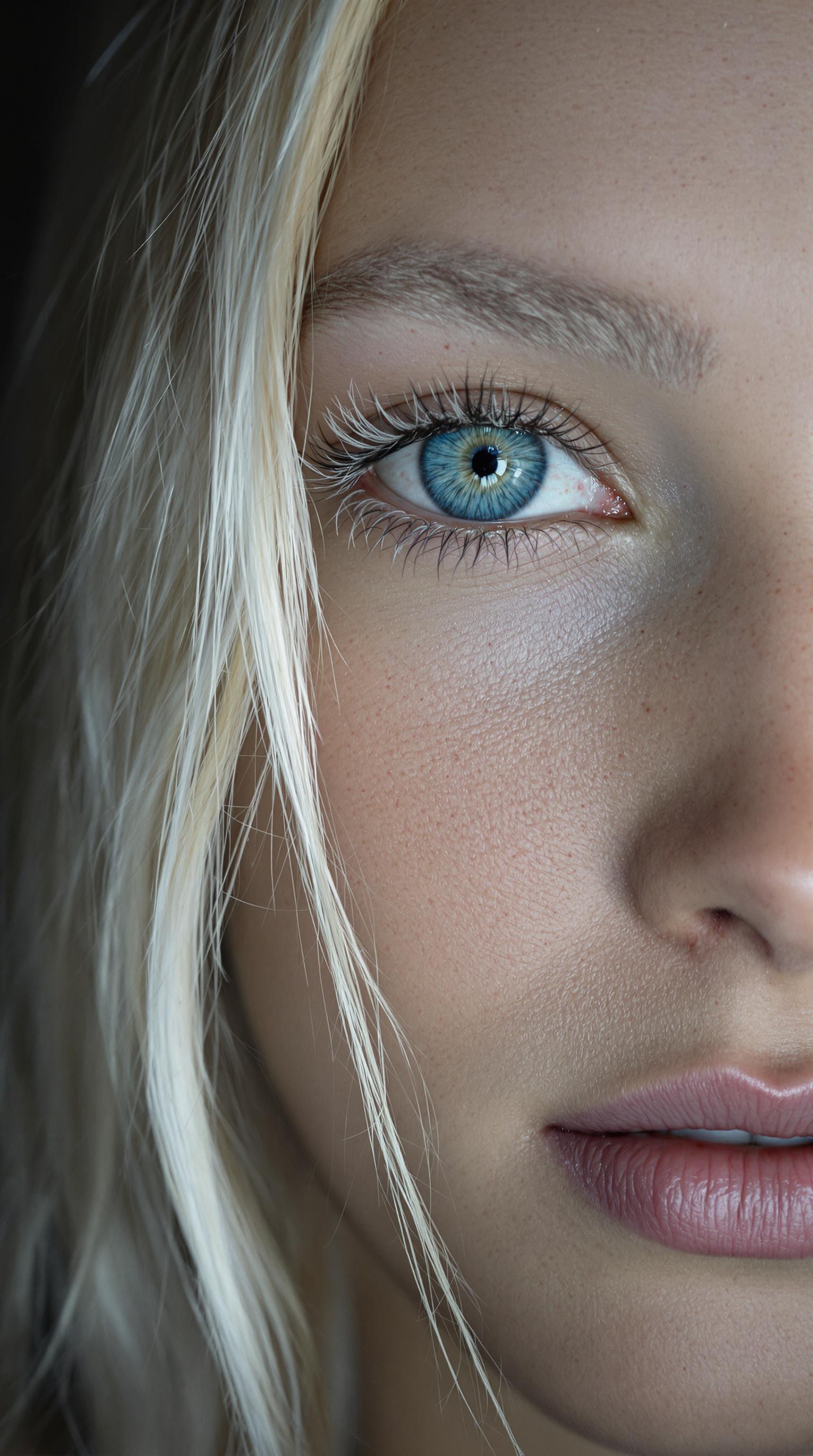 breathtaking professional closeup photo of a 19 yo girl with silver blond long hair, white eyebrows, white eyelashes, pale skin, light freckles, amazing detailed clear ice blue eyes, Hasselblad professional studio photoshoot, light from the side, dark background