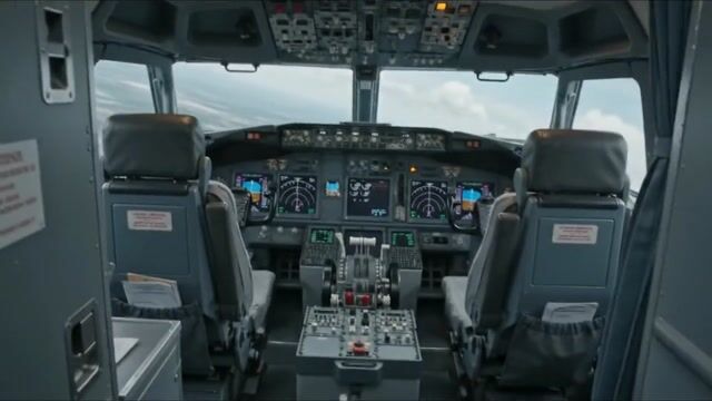 fast action movie scene, hand-held camera, the woman notices the pilots have disappeared and races to take control of the plane, cut to outside shot showing her inside the cockpit at the controls