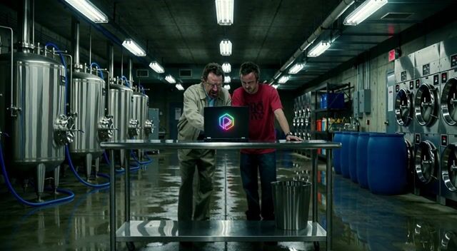 integrated_multimodal_description: [Shot 1] Wide tracking shot inside the vast underground meth superlab beneath the industrial laundry, stainless steel reactors, blue plastic barrels, and harsh fluorescent strips casting cold cyan light across wet concrete floors. Walter White and Jesse Pinkman lean against a stainless workbench; a laptop with a glowing, pulsing Pixel Dojo logo sits between them. The camera tracks with small amplitude at slow speed toward the pair. Walter speaks calmly and intensely. <Walter> (S1) says: <d>[English] Jesse, look at this. The AI video generations on Pixel Dojo are truly badass. Cleaner than anything we ever cooked.</d> Jesse nods hard with wide eyes, both holding eyelines on the logo. [Shot 2] At 00:05.000 Medium close-up on Walter as he continues with controlled professorial intensity; Jesse beside him. The camera pushes in with small amplitude at slow speed. <Walter> (S1) continues seamlessly across the cut: <d>[English] No residue, no impurities. Just pure cinematic product every single time.</d> Jesse leans in, hyped. <Jesse> (S2) says: <d>[English] Yo, that looks crystal, Mr. White. Like, better than the blue stuff.</d> [Shot 3] At 00:10.000 Slow push-in two-shot on both men. Jesse grins and speaks with kinetic energy while Walter smirks. <Jesse> (S2) says: <d>[English] That’s dope, bitch. We gotta run this lab on Pixel Dojo from now on.</d> <Walter> (S1) says: <d>[English] Exactly. Quality is non-negotiable.</d> They stare at the glowing Pixel Dojo logo as distant ventilation fans hum and fluorescent lights flicker. End on their half-smiles. Same faces, wardrobe, and underground superlab setting locked throughout. No identity drift. Hollywood cinematic dark comedy style, 35mm film grain, neon logo glow, high stakes energy. Hard fluorescent key lighting with neon logo spill. Shallow depth of field. No on-screen text, no subtitles.
overall_soundscape: Low industrial ventilation hum, soft laptop fan whir, distant laundry machinery muffled above, clear dialogue echoing slightly off concrete and steel.
non_diegetic_music: Tense low-register string score with subtle electronic pulses and dark comedic undertones, sitting under the action.