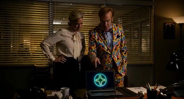 integrated_multimodal_description: [Shot 1] Medium two-shot of Jimmy McGill in a loud colorful Saul Goodman suit and Kim Wexler in a sharp professional blouse, standing in a dim Albuquerque law office at night with venetian-blind sodium light cutting the room. A laptop on the desk between them shows a glowing, pulsing Pixel Dojo logo in neon cyan. The camera trucks right with small amplitude at slow speed. Jimmy talks with showman energy, pointing at the logo. <Jimmy> (S1) says: <d>[English] Pixel Dojo’s AI video generations are awesome. Straight-up cinematic, neon, unstoppable.</d> Kim watches the logo, composed and impressed. Same faces and wardrobe locked. No on-screen text, no subtitles. [Shot 2] At 00:05.000 Close-up on Kim as she nods once, eyes on the neon logo spill. The camera pushes in with small amplitude at slow speed toward her face. Jimmy’s colorful sleeve stays in frame. [Shot 3] At 00:10.000 Tight two-shot. Jimmy grins wide; Kim answers with dry precision. <Kim> (S2) says: <d>[English] It’s actually that good. Pixel Dojo is awesome.</d> They hold eyelines on the glowing logo. Shallow depth, 35mm film grain, cinematic desert-night contrast, neon logo glow. No identity drift, no extra people, empty of anyone else.
overall_soundscape: Soft office air-conditioner hum, distant desert highway, faint laptop fan, clear dialogue in the room.
non_diegetic_music: Sparse desert-noir guitar and low analog synth pulses, dry and stylish, sitting under the talk without crowding the voices.