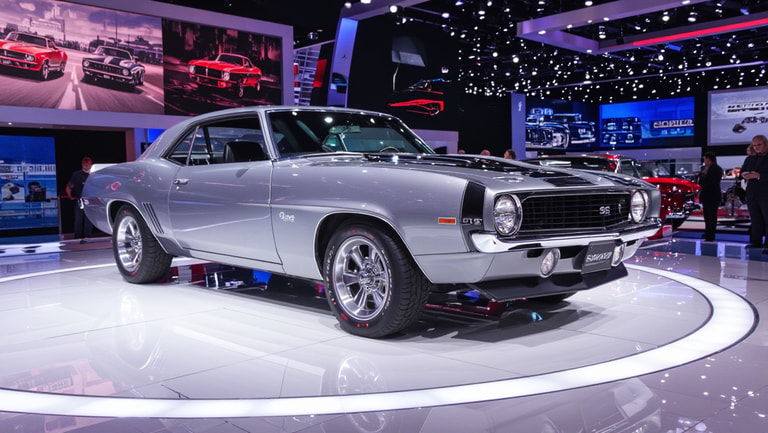 Classic Muscle Car at Modern Exhibition