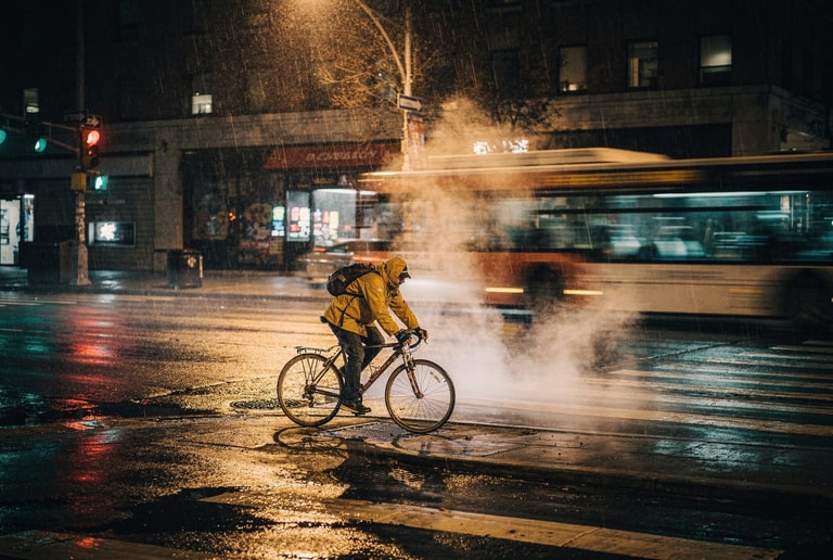 Night Cyclist In Rain