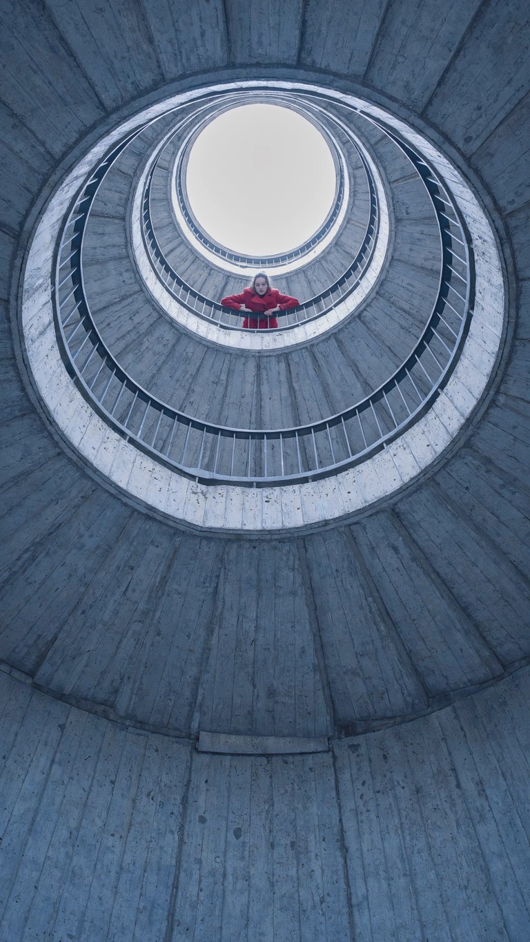 Red Coat in Concrete Spiral