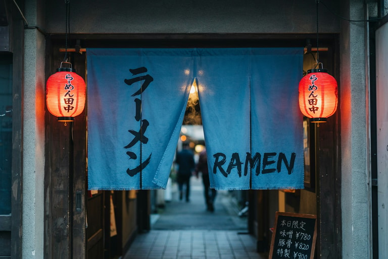 Blue Noren Between Lanterns
