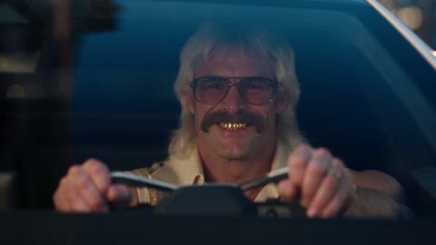 Duke behind the wheel in the film