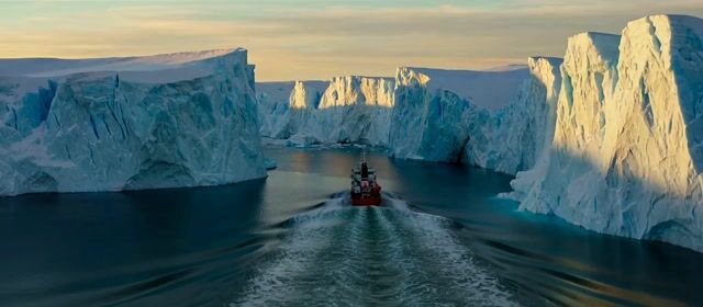 Red Ship Through Ice Fjord