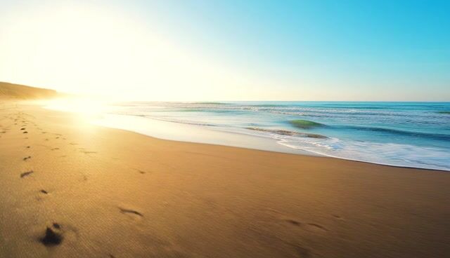 Footprints Along Golden Hour Shore