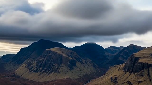 Clouds Rolling Over Highland Peaks