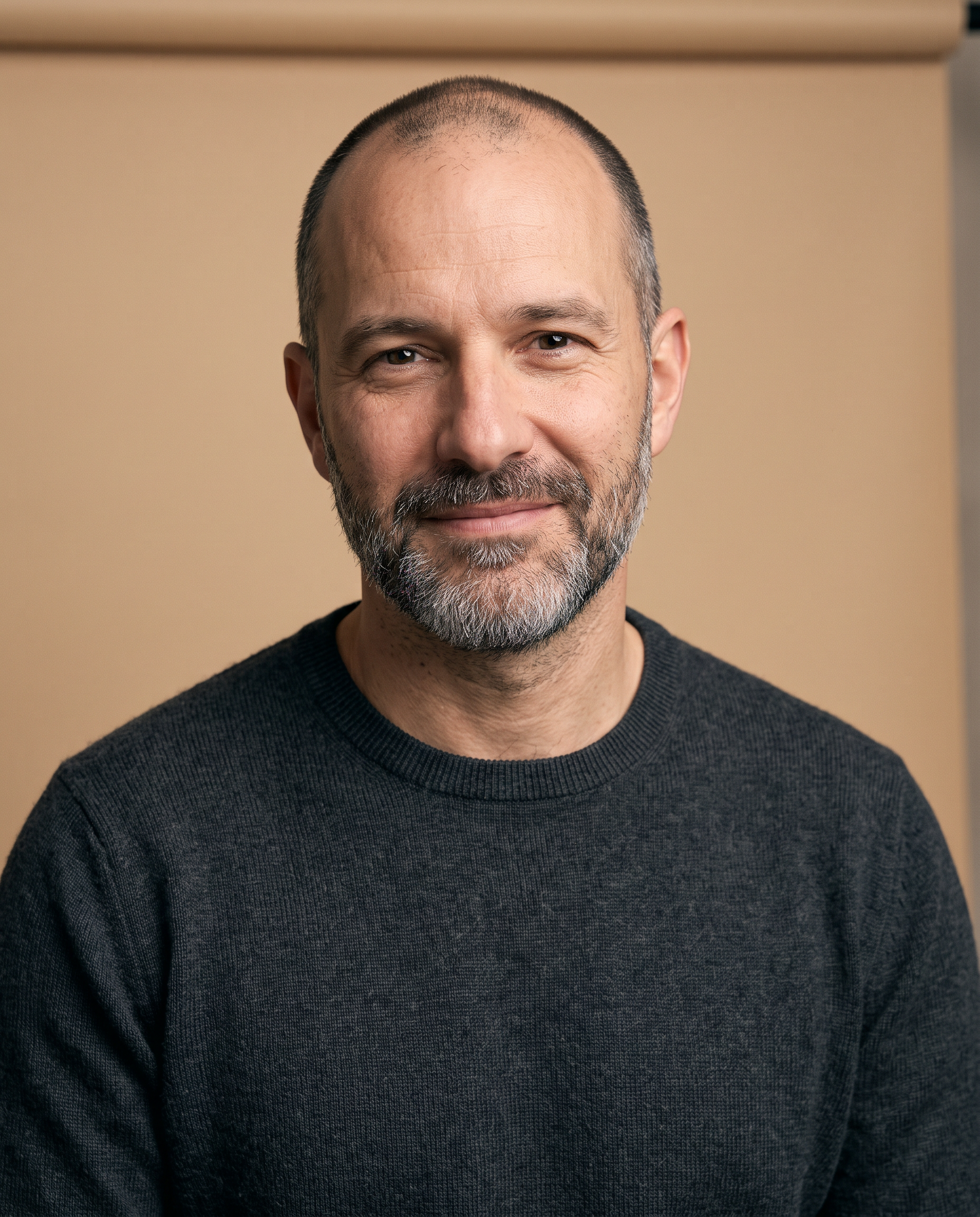 Step 2, the model on Nano Banana 2.1: a man in his forties with a salt and pepper beard and a charcoal sweater