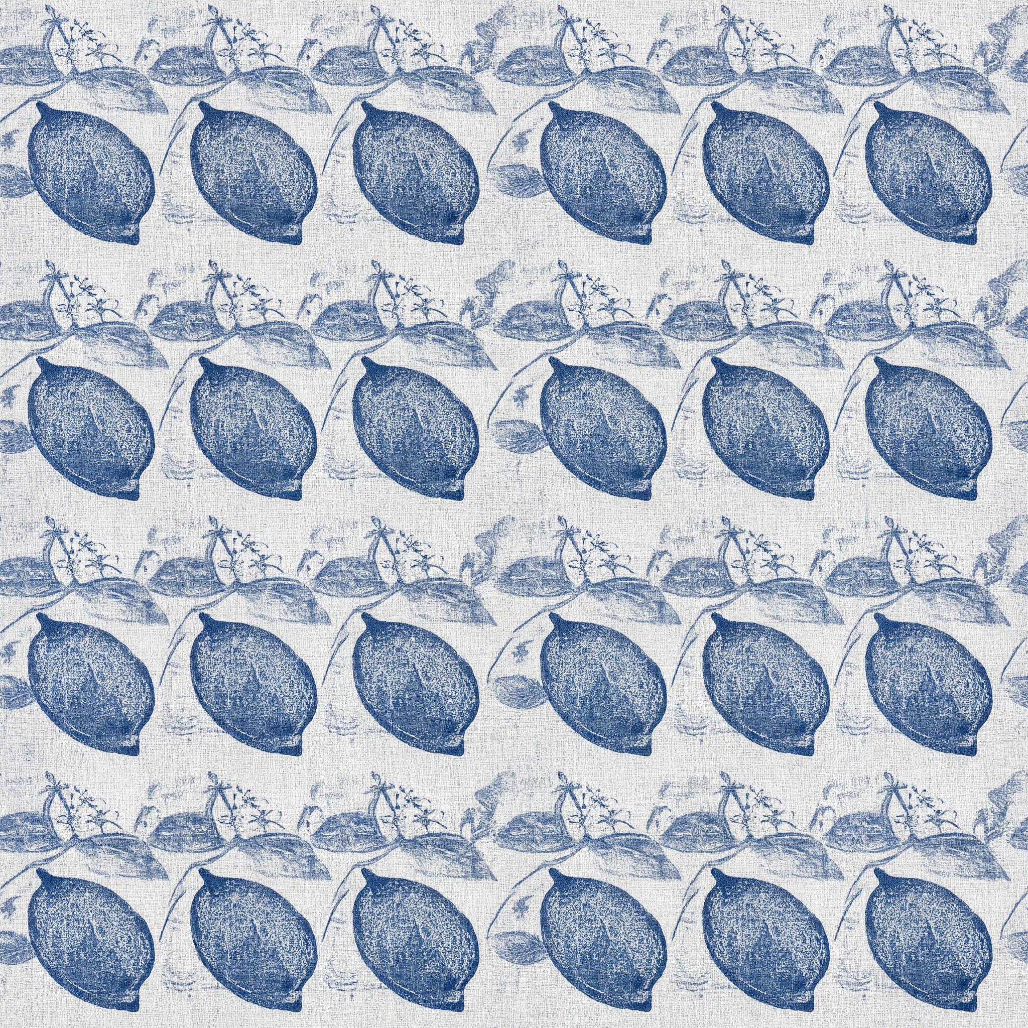 A repeating pattern of indigo lemons and leaves stamped on pale cotton